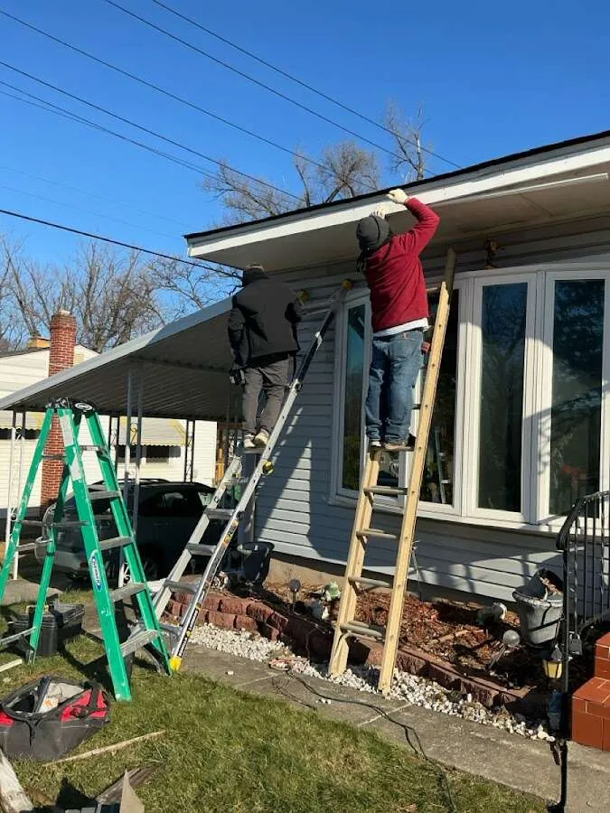 Restoration crew performing exterior repair in Douglas